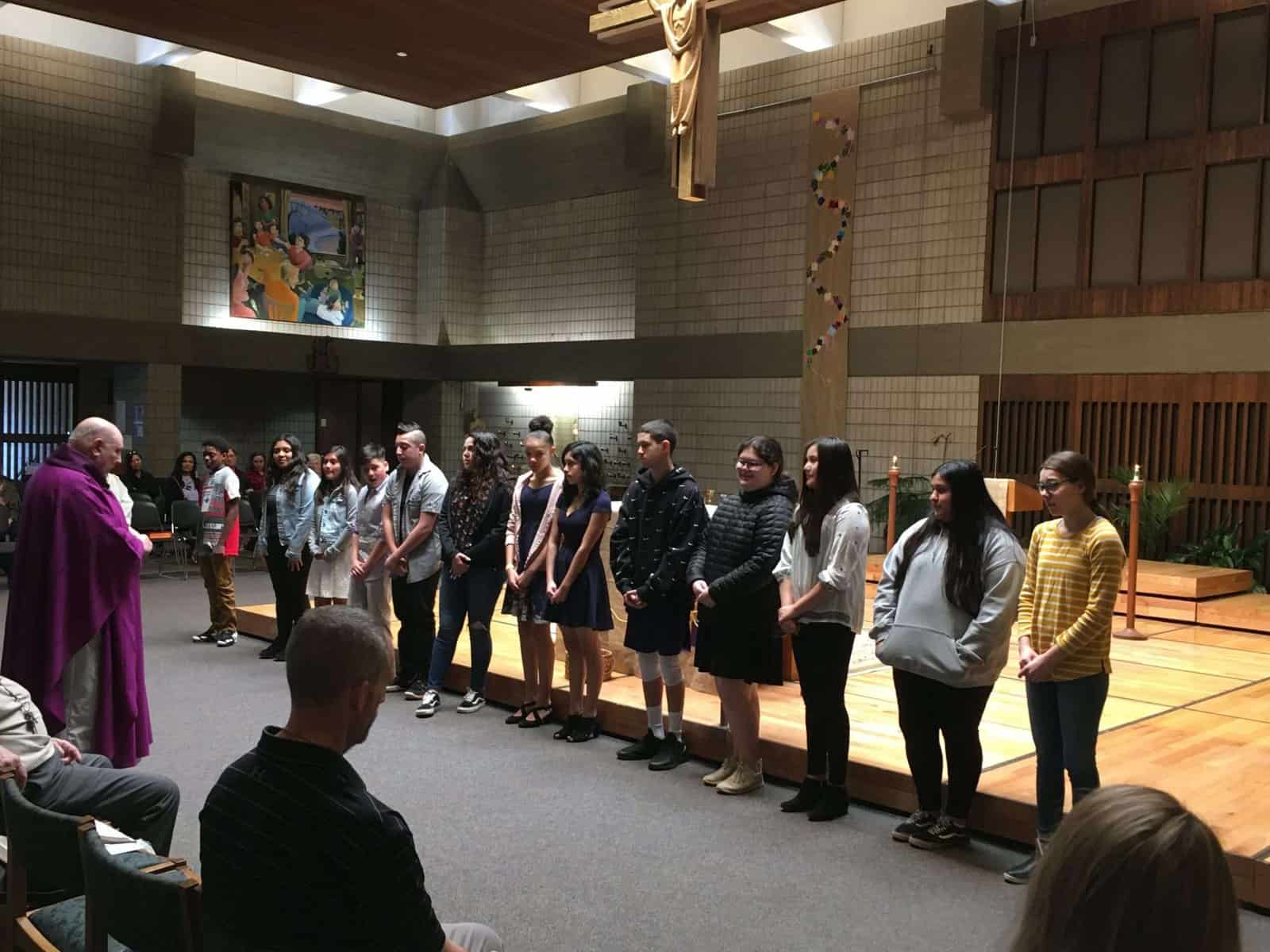 Blessing of Confirmation candidates by Fr. Steve Adrian on Sunday, March 8, at the 10:15 am Mass
