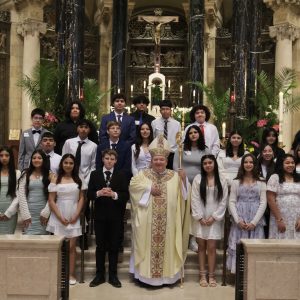 Archbishop Bernard Hebda at the Cathedral of Saint Paul on April 14 with 26 newly confirmed students from the Church of Saint Matthew. The students include 17 who attend the Saint Matthew Faith Formation program, and 9 who attend Community of Saints Regional Catholic School.